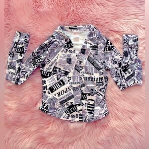 Newspaper print blouse